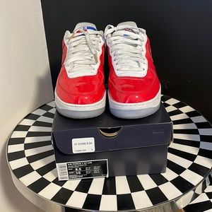 Air Force 1’s university red. Bubble gum bottoms in light blue.